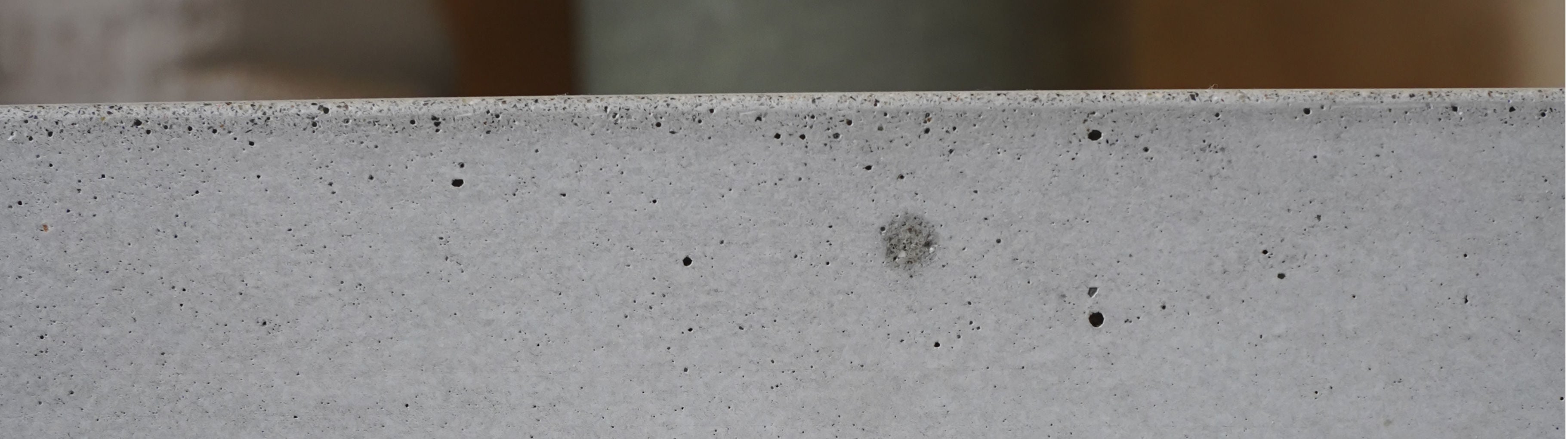 Wall with technical recessed luminaires in GFRC
